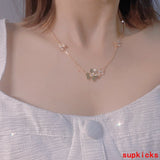 Front view of Van Cleef & Arpels unisex jewelry piece