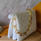 Handle and strap detail of structured premium women's handbag – women's designer-style accessory