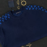 Close-up detail shot of Louis Vuitton luxury clothing with contemporary cut
