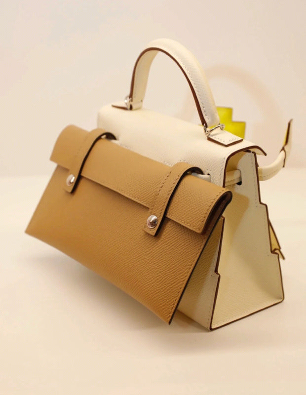  Graceful top-handle bag carried on shoulder 10
