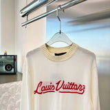Close-up detail shot of Louis Vuitton luxury clothing with monogram-inspired silhouette