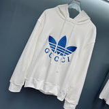 Side profile of Gucci luxury clothing with logo-detail design