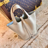  Tailored shoulder bag carried on shoulder