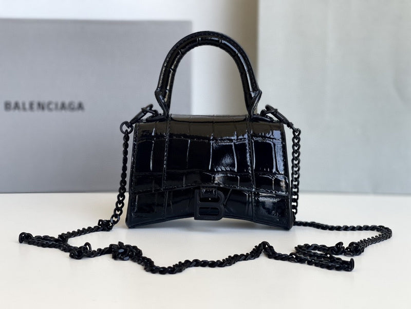 Zivas Charm Classic Sensibility Statement Handbag (Considered Detail & Form) – Angled View