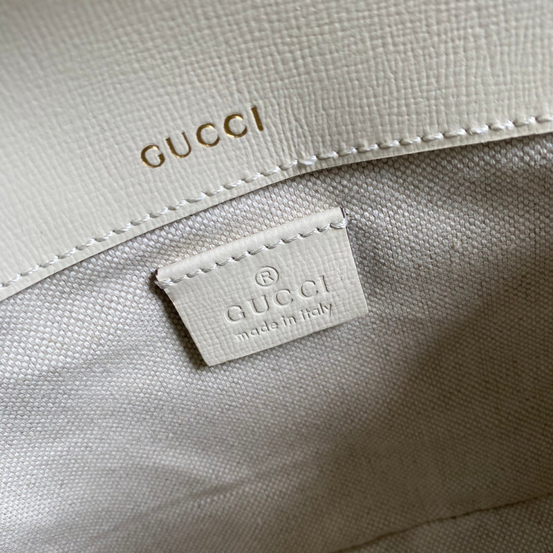 Side profile of signature sleek women's handbag – women's premium purse
