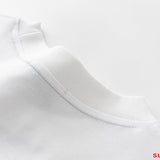 Side profile of Moncler luxury clothing with monogram-inspired silhouette