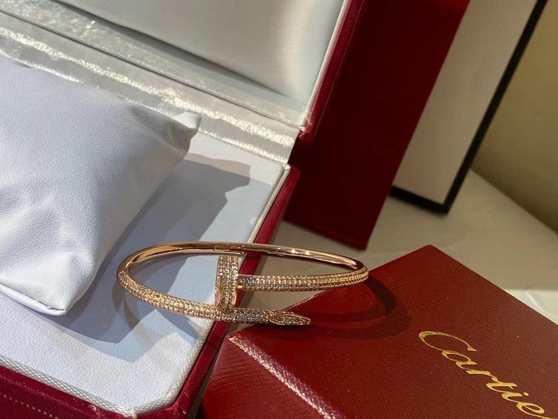 Angled view of Cartier unisex jewelry piece