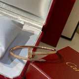 Angled view of Cartier unisex jewelry piece