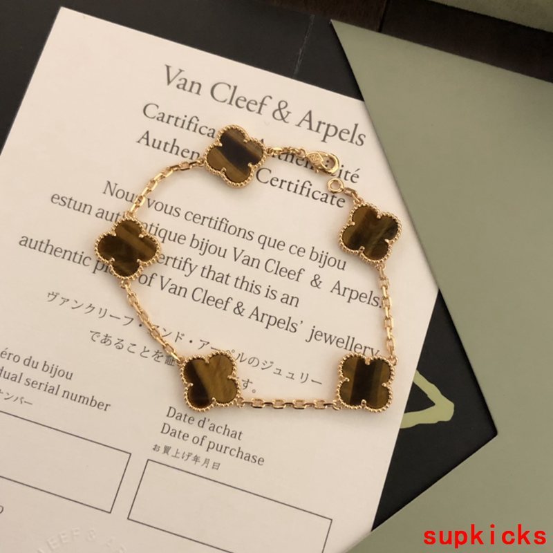 Close-up detail view of Van Cleef & Arpels unisex jewelry piece