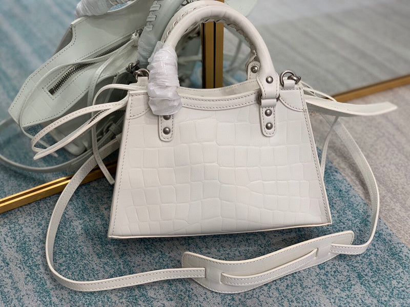 Understated Premium PU Leather Handbag - Statement Silhouette | Women's Premium Handbag #665 - back view (image 4) of designer-inspired handbag
