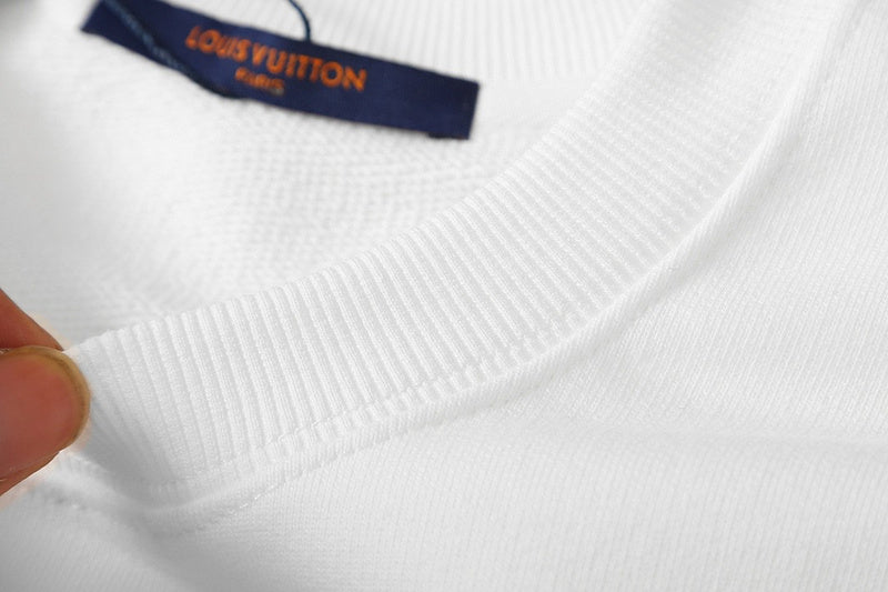 Full styled look of Louis Vuitton luxury clothing with signature branding
