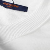 Full styled look of Louis Vuitton luxury clothing with signature branding