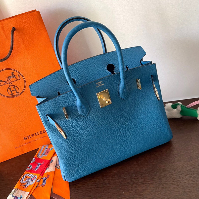 Side view of modernist structured handbag
