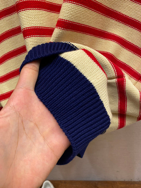 Side profile of Gucci luxury clothing with label-forward styling