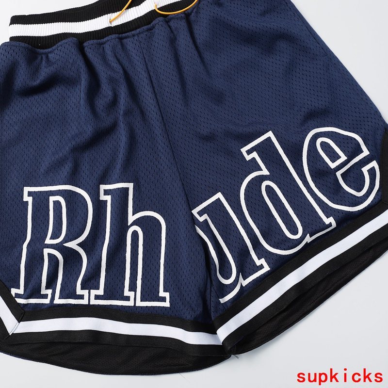 Flat lay presentation of Rhude luxury clothing with logo-detail design