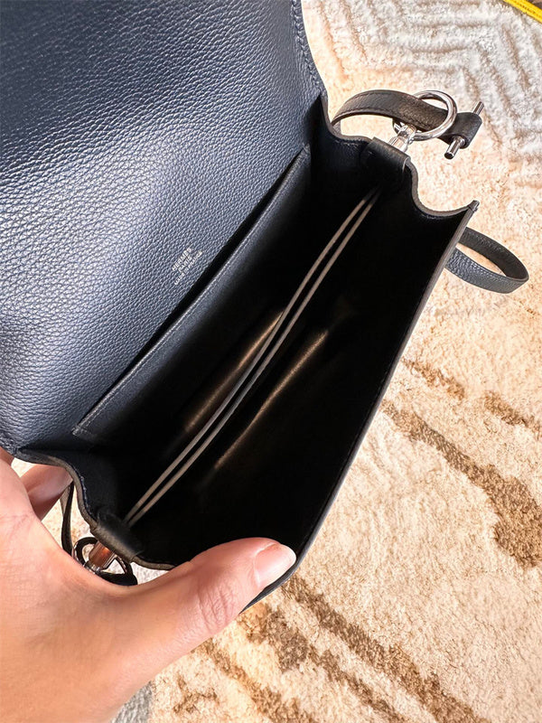 Side view of elegant structured handbag