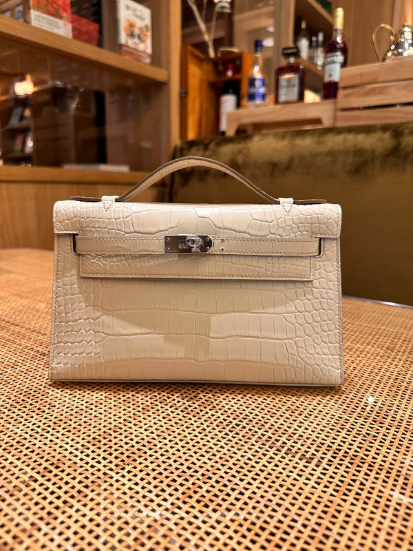  clean-lined crossbody bag detail view showing craftsmanship