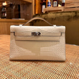  clean-lined crossbody bag detail view showing craftsmanship