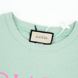 Close-up detail shot of Gucci luxury clothing with contemporary cut