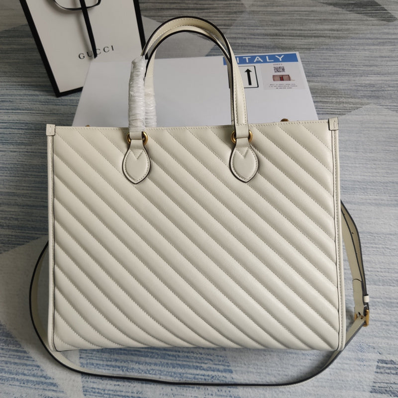 Side profile of chic sleek women's handbag – women's statement bag