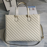 Side profile of chic sleek women's handbag – women's statement bag