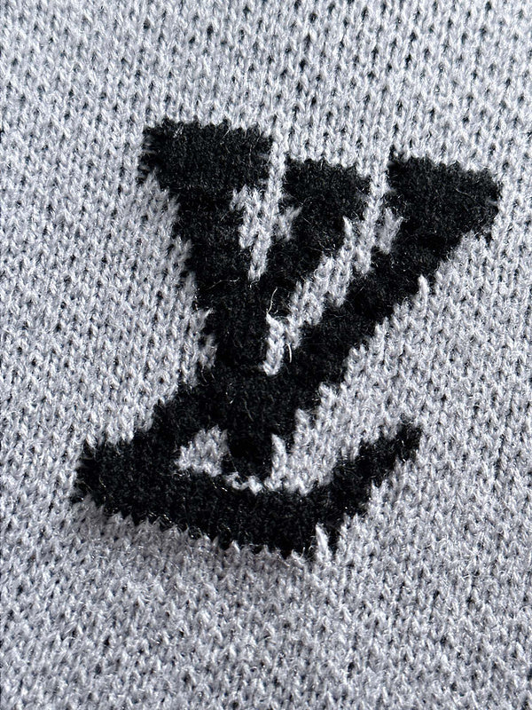 Full styled look of Louis Vuitton luxury clothing with signature branding
