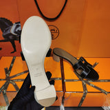 Hermès Black Ankle Strap Sandals - Heel Detail View