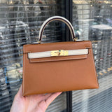 Side view of poised structured handbag