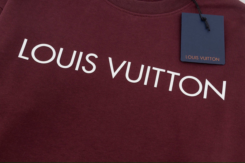 Flat lay presentation of Louis Vuitton luxury clothing with contemporary cut