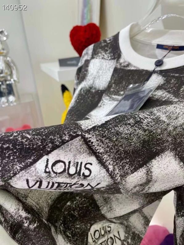 Close-up detail shot of Louis Vuitton luxury clothing with streetwear-inspired cut