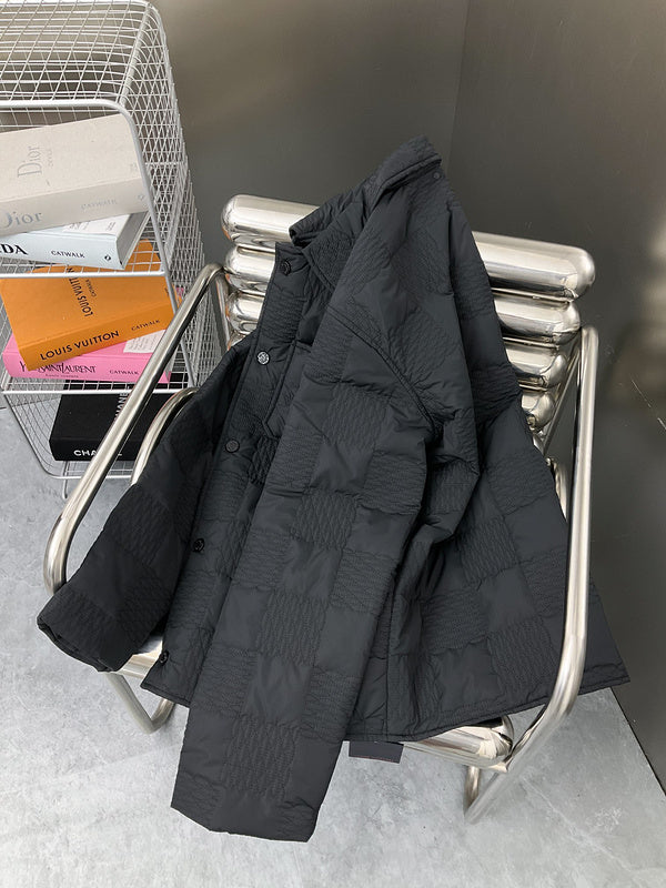 Close-up detail shot of Louis Vuitton luxury clothing with label-forward styling