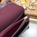 Handle and strap detail of everyday-luxe sleek women's handbag – women's designer-style accessory