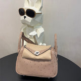  refined crossbody bag styled with outfit