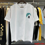 Close-up detail shot of Rhude luxury clothing with relaxed-fit cut