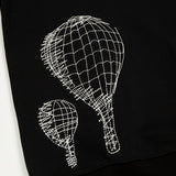 Full styled look of Louis Vuitton luxury clothing with monogram-inspired silhouette