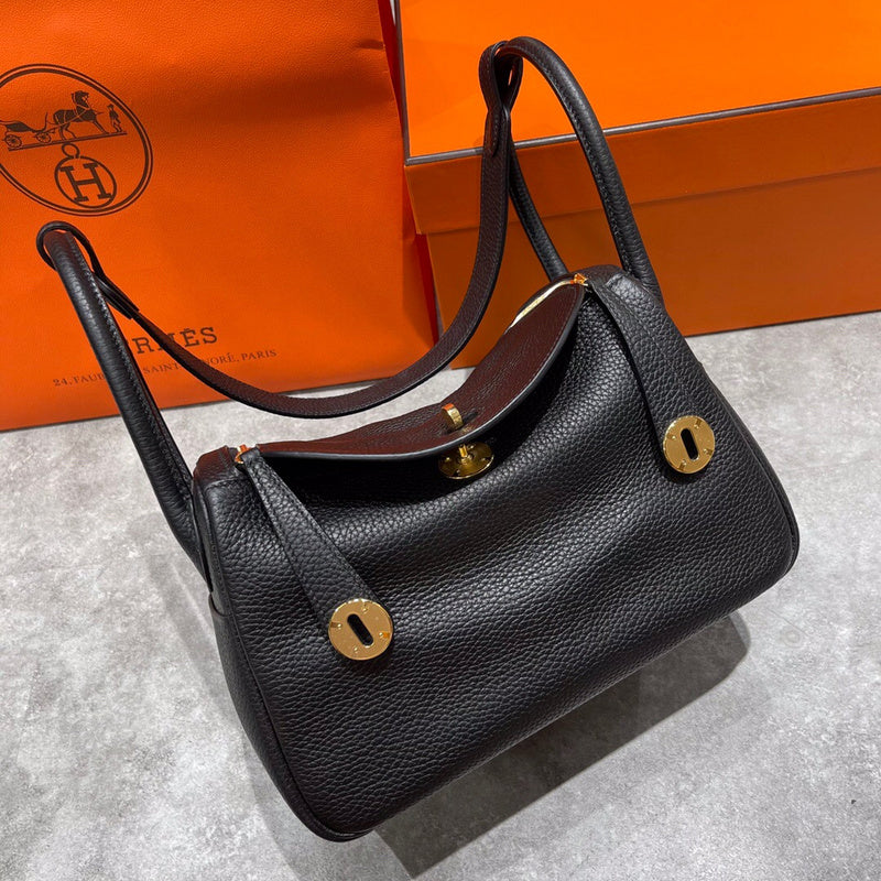 Side view of sophisticated structured handbag