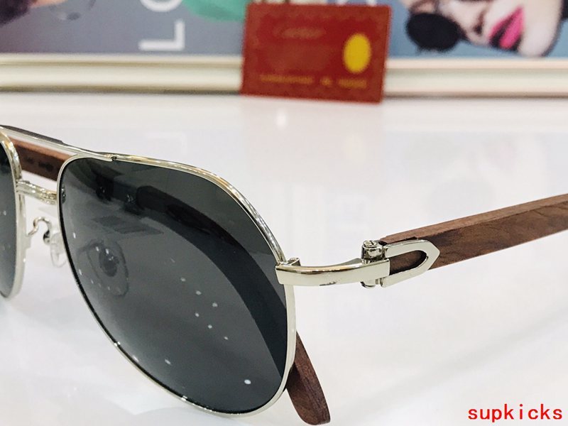 Close-up detail view of Cartier unisex sunglasses