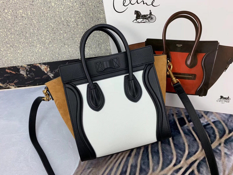 Handle and strap detail of refined polished women's handbag – women's statement bag