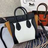 Handle and strap detail of refined polished women's handbag – women's statement bag
