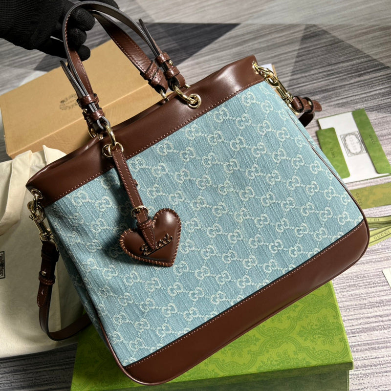 Handle and strap detail of elevated structured women's handbag – women's designer-style accessory