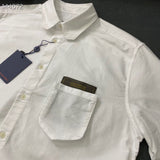 Front view of Louis Vuitton luxury clothing with contemporary cut
