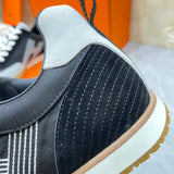 Hermès Camel Pointed-Toe Flats - Close-Up Texture View