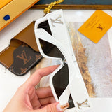 Angled view of Louis Vuitton unisex sunglasses