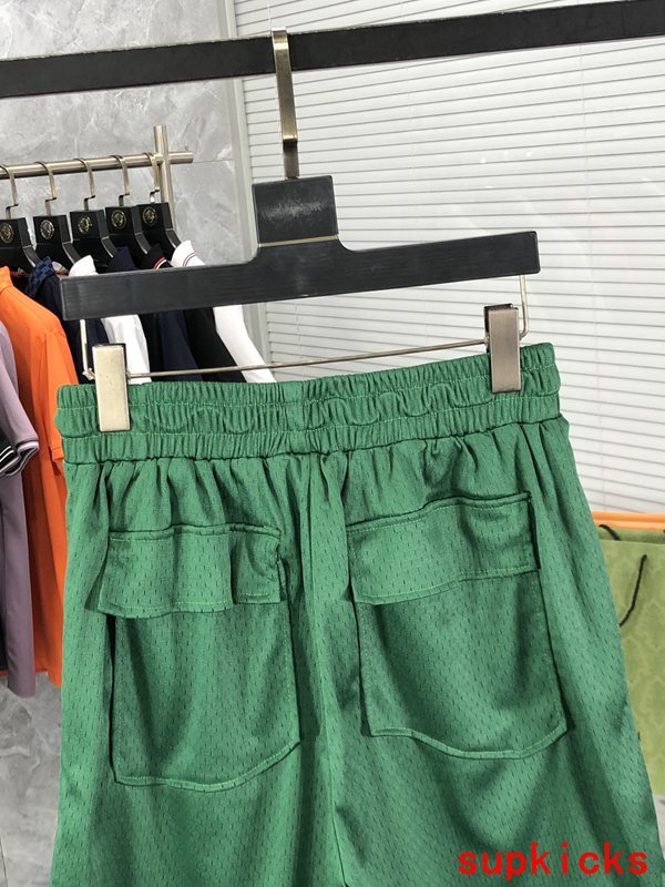 Front view of Rhude luxury clothing with monogram-inspired silhouette