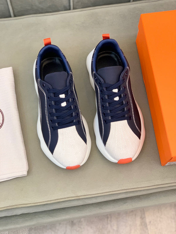 Hermes shoes Style 186 - close-up of statement logo accent