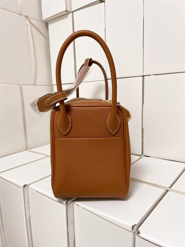  graceful top-handle bag detail view showing craftsmanship 8