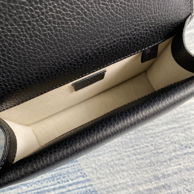 Close-up detail of everyday-luxe signature women's handbag – women's designer-style accessory