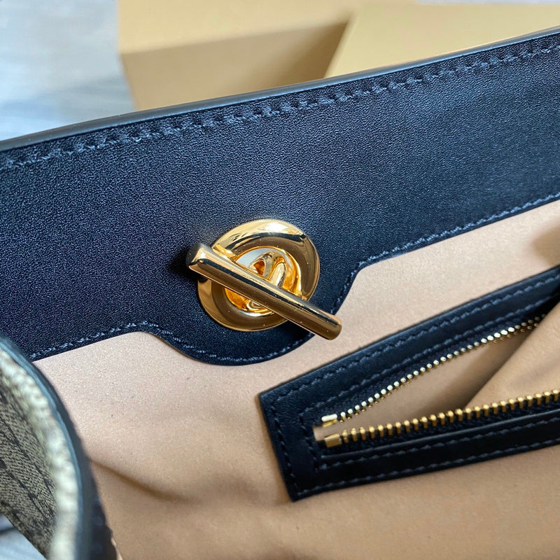 Side profile of refined elevated women's handbag – women's statement bag