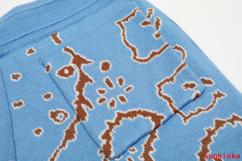 Close-up detail shot of Rhude luxury clothing with label-forward styling