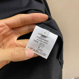 Close-up detail shot of Givenchy luxury clothing with contemporary cut